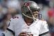 FOXBORO, MA - SEPTEMBER 22: Josh Freeman #5 of the Tampa Bay Buccaneers drops back to pass during the second half of their 23-3 loss to the New England Patriots at Gillette Stadium on September 22, 2013 in Foxboro, Massachusetts. (Photo by Winslow Townso