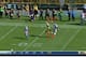 Cobb outjumps the defender to make the one-handed reception.