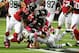ATLANTA, GA - OCTOBER 7: Bilal Powell #29 of the New York Jets is tackled by Thomas DeCoud #28, Stephen Nicholas #54, and Desmond Trufant #21 of the Atlanta Falcons at the Georgia Dome on October 7, 2013 in Atlanta, Georgia. (Photo by Scott Cunningham/Get