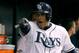 Oct 8, 2013; St. Petersburg, FL, USA; Tampa Bay Rays shortstop Yunel Escobar (11) celebrates and points in the dugout after he scored a run during the sixth inning of game four of the American League divisional series against the Boston Red Sox at Tropica