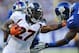 EAST RUTHERFORD, NJ - SEPTEMBER 15: Knowshon Moreno #27 of the Denver Broncos runs in for a touchdown past Antrel Rolle #26 of the New York Giants at MetLife Stadium on September 15, 2013 in East Rutherford, New Jersey. (Photo by Maddie Meyer/Getty Imag