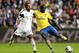 SWANSEA, WALES - SEPTEMBER 28: Bacary Sagna of Arsenal (R) in action with Wayne Routledge of Swansea during the Barclays Premier League match between Swansea City and Arsenal at Liberty Stadium on September 28, 2013 in Swansea, Wales. (Photo by Scott He