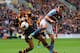 HULL, ENGLAND - OCTOBER 05: Curtis Davies of Hull and Libor Kozak of Aston Villa compete for the ball during the Barclays Premier League match between Hull City and Aston Villa at KC Stadium on October 5, 2013 in Hull, England. (Photo by Julian Finney/G