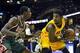 Oct 8, 2013; Cleveland, OH, USA; Milwaukee Bucks point guard Brandon Knight (11) defends Cleveland Cavaliers point guard Kyrie Irving (2) in the second quarter at Quicken Loans Arena. Mandatory Credit: David Richard-USA TODAY Sports