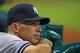 HOUSTON, TX - SEPTEMBER 27: Manager Joe Girardi #28 of the New York Yankees watches from the dugout during the game against the Houston Astros at Minute Maid Park on September 27, 2013 in Houston, Texas. (Photo by Scott Halleran/Getty Images)