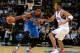 MANCHESTER, ENGLAND - OCTOBER 08: Kevin Durant of Oklahoma City holds off James Anderson of Philadelphia 79ers during the NBA pre season match between Oklahoma City Thunder and Philadelphia 76ers at Phones 4 U Arena on October 8, 2013 in Manchester, Eng