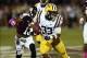 Oct 5, 2013; Starkville, MS, USA; LSU Tigers running back Jeremy Hill (33) advances the ball while followed by Mississippi State Bulldogs defensive back Cedric Jiles (13) at Davis Wade Stadium. LSU Tigers defeated the Mississippi State Bulldogs 59-26. M
