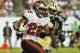 TAMPA, FL - SEPTEMBER 15: Running back Doug Martin #22 of the Tampa Bay Buccaneers rushes upfield in the 4th quarter against the New Orleans Saints September 15, 2013 at Raymond James Stadium in Tampa, Florida. The Saints won 16 - 14. (Photo by Al Mess