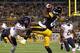 PITTSBURGH, PA - SEPTEMBER 22: Antonio Brown #84 of the Pittsburgh Steelers catches a 33 yard touchdown pass in the second quarter against Tim Jennings #26 of the Chicago Bears during the game on September 22, 2013 at Heinz Field in Pittsburgh, Pennsylv