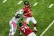 ATLANTA, GA - OCTOBER 7: Matt Ryan #2 of the Atlanta Falcons fumbles as he is hit by Muhammad Wilkerson #96 of the New York Jets at the Georgia Dome on October 7, 2013 in Atlanta, Georgia. (Photo by Scott Cunningham/Getty Images)