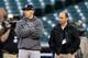 DETROIT, MI - OCTOBER 16: (L-R) Manager Joe Girardi and general manager Brian Cashman of the New York Yankees talk during batting practice against the Detroit Tigers during game three of the American League Championship Series at Comerica Park on October