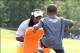 Jun 28, 2013; Berea, OH, USA; Green Bay Packers player Eddy Lacy works with kids during a NFL Play 60 event during the NFC Rookie Symposium at the Cleveland Browns Training Facility. Mandatory Credit: Ron Schwane-USA TODAY Sports