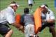 Jun 28, 2013; Berea, OH, USA; San Francisco 49ers player Eric Reid, right, and Vance McDonald run kids through drills during a NFL Play 60 event during the NFC Rookie Symposium at the Cleveland Browns Training Facility. Mandatory Credit: Ron Schwane-USA T