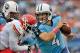 Oct 6, 2013; Nashville, TN, USA; Tennessee Titans quarterback Ryan Fitzpatrick (4) scrambles to avoid the sack by Kansas City Chiefs outside linebacker Tamba Hali (91) during the first half at LP Field. Mandatory Credit: Jim Brown-USA TODAY Sports