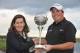 FARO, PORTUGAL - OCTOBER 14: Shane Lowry of Ireland is presented with the trophy by Cecilia Meireles, secretary of state for tourism after winning the Portugal Masters at the Victoria golf course at Villamoura on October 14, 2012 in Faro, Portugal. (Pho