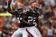 Sep 29, 2013; Cleveland, OH, USA; Cleveland Browns cornerback Buster Skrine (22) celebrates with strong safety T.J. Ward (43) during the fourth quarter against the Cincinnati Bengals at FirstEnergy Stadium. Browns beat the Bengals 17-6. Mandatory Credit: