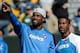 Oct 6, 2013; Green Bay, WI, USA; Detroit Lions wide receiver Calvin Johnson (left) watches the Lions warm up with with wide receiver Nate Burleson (right) prior to the game against the Green Bay Packers at Lambeau Field. Mandatory Credit: Benny Sieu-USA