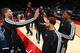 WASHINGTON, DC - OCTOBER 8: Brook Lopez #11, Deron Williams #8, Paul Pierce #34 and Kevin Garnett #2 of the Brooklyn Nets high five during pre-game announcements against the Washington Wizards during the pre-season game at the Verizon Center on October 8,