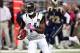 Oct 6, 2013; St. Louis, MO, USA; Jacksonville Jaguars wide receiver Justin Blackmon (14) carries the ball for a touchdown during the first quarter against the St. Louis Rams at The Edward Jones Dome. Mandatory Credit: Scott Kane-USA TODAY Sports