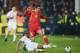PODGORICA, MONTENEGRO - MARCH 26: Stevan Jovetic of Montenegro is tackled by Glen Johnson of England during the FIFA 2014 World Cup Qualifier Group H match between Montenegro and England at City Stadium on March 26, 2013 in Podgorica, Montenegro. (Photo