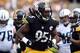 Sep 8, 2013; Pittsburgh, PA, USA; Pittsburgh Steelers linebacker Jarvis Jones (95) celebrates a tackle against the Tennessee Titans during the first half at Heinz Field. Mandatory Credit: Jason Bridge-USA TODAY Sports