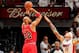 MIAMI, FL - MAY 15: Taj Gibson #22 of the Chicago Bulls shoots against Chris Andersen #11 of the Miami Heat in Game Five of the Eastern Conference Semifinals during the 2013 NBA Playoffs on May 15, 2013 at American Airlines Arena in Miami, Florida. NOTE T