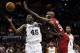 Jun 11, 2013; San Antonio, TX, USA; San Antonio Spurs center DeJuan Blair (45) and Miami Heat center Joel Anthony (50) go for a rebound during the fourth quarter of game three of the 2013 NBA Finals at the AT&T Center. San Antonio Spurs won 113-77. Manda