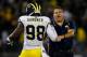 EAST HARTFORD, CT - SEPTEMBER 21: Brady Hoke, coach of the Michigan Wolverines, congratulates Devin Gardner #98 after a touchdown in the second half against the Connecticut Huskies at Rentschler Field on September 21, 2013 in East Hartford, Connecticut.