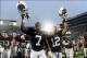 Sep 21, 2013; University Park, PA, USA; Penn State Nittany Lions linebacker Stephen Obeng-Agyapong (7) and cornerback Jordan Smith (12) celebrate after beating the Kent State Golden Flashes 34-0 at Beaver Stadium. Mandatory Credit: Evan Habeeb-USA TODAY S