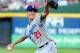 ATLANTA, GA - OCTOBER 04: Zack Greinke #21 of the Los Angeles Dodgers pitches in the first inning against the Atlanta Braves during Game Two of the National League Division Series at Turner Field on October 4, 2013 in Atlanta, Georgia. (Photo by Scott C