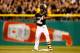PITTSBURGH, PA - OCTOBER 06: Andrew McCutchen #22 of the Pittsburgh Pirates celebrates a double in the eighth inning against the St. Louis Cardinals during Game Three of the National League Division Series at PNC Park on October 6, 2013 in Pittsburgh, Pen