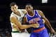 Oct 9, 2013; Providence, RI, USA; Boston Celtics power forward Kris Humphries (left) and New York Knicks small forward Metta World Peace (51) battle for a loose ball during the first half at Dunkin Donuts Center. Mandatory Credit: Mark L. Baer-USA TODAY S