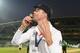 LONDON, ENGLAND - AUGUST 25: Kevin Pietersen of England kisses the urn after England won the Ashes during day five of the 5th Investec Ashes Test match between England and Australia at the Kia Oval on August 25, 2013 in London, England. (Photo by Gareth