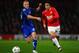 MANCHESTER, ENGLAND - NOVEMBER 02: Fabio Da Silva takes on of Manchester United holds off Gabriel Giurgiu of Otelul Galati during the UEFA Champions League Group C match between Manchester United and Otelul Galati at Old Trafford on November 2, 2011 in M