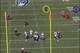 Bryant has little room to move and Romo has only a tight space to aim for.