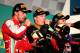 MELBOURNE, AUSTRALIA - MARCH 17: Race winner Kimi Raikkonen (C) of Finland and Lotus celebrates on the podium with second placed Fernando Alonso (L) of Spain and Ferrari and third placed Sebastian Vettel (R) of Germany and Infiniti Red Bull Racing follow