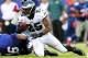EAST RUTHERFORD, NJ - OCTOBER 06: LeSean McCoy #25 of the Philadelphia Eagles tries to get a few yards as Mike Patterson #93 of the New York Giants defends at MetLife Stadium on October 6, 2013 in East Rutherford, New Jersey. (Photo by Elsa/Getty Images