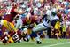 LANDOVER, MD - SEPTEMBER 22: Calvin Johnson #81 of the Detroit Lions scores a touchdown in the fourth quarter during a game against the Washington Redskins at FedExField on September 22, 2013 in Landover, Maryland. (Photo by Patrick McDermott/Getty Imag