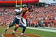 DENVER, CO - SEPTEMBER 29: Wide receiver Demaryius Thomas #88 of the Denver Broncos scores a third quarter touchdown under coverage by cornerback Bradley Fletcher #24 of the Philadelphia Eagles at Sports Authority Field Field at Mile High on September 29