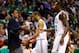 BOSTON, MA - MARCH 29: Rajon Rondo of the Boston Celtics congratulates teammate Brandon Bass #30 during a timeout against the Atlanta Hawks during the game on March 29, 2013 at TD Garden in Boston, Massachusetts. NOTE TO USER: User expressly acknowledges