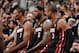SAN ANTONIO, TX - JUNE 16: Chris Bosh #1, LeBron James #6 and Dwyane Wade #3 of the Miami Heat sit at the scorers' table during Game Five of the 2013 NBA Finals against the San Antonio Spurs on June 16, 2013 at the AT&T Center in San Antonio, Texas. NOTE
