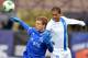 KHIMKI, RUSSIA - SEPTEMBER 29: Aleksandr Kokorin (L) of FC Dinamo Moscow challenged by Nadson of FC Krylia Sovetov Samara during the Russian Premier League match between FC Dinamo Moscow and FC Krylia Sovetov Samara at the Rodina Stadium on September 29,