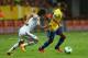 Moura in action against Japan.
