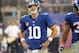 Oct 6, 2013; East Rutherford, NJ, USA; New York Giants quarterback Eli Manning (10) reacts after throwing an interception in the 4th quarter against the Philadelphia Eagles during the game at MetLife Stadium. Mandatory Credit: Robert Deutsch-USA TODAY Spo