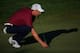 FARO, PORTUGAL - OCTOBER 10: Ross Fisher of England lines up a putt on the 18th green during the first round of the Portugal Masters at Oceanico Victoria Golf Course on October 10, 2013 in Faro, Portugal. (Photo by Dean Mouhtaropoulos/Getty Images)