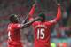LIVERPOOL, ENGLAND - OCTOBER 05: Daniel Sturridge of Liverpool celebrates with Kolo Toure after scoring the second goal during the Barclays Premier League match between Liverpool and Crystal Palace at Anfield on October 5, 2013 in Liverpool, England. (P