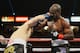 CARSON, CA - MARCH 16: Contender Ruslan Provodnikov lands a punch to the head of WBO Welterweight Champion Timothy Bradley during their WBO Welterweight Championship boxing match at The Home Depot Center on March 16, 2013 in Carson, California. (Photo b