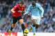 MANCHESTER, ENGLAND - DECEMBER 09: Yaya Toure of Manchester City competes with Michael Carrick of Manchester United during the Barclays Premier League match between Manchester City and Manchester United at the Etihad Stadium on December 9, 2012 in Manche