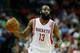 HOUSTON, TX - APRIL 12: James Harden #13 of the Houston Rockets brings the ball up court during the game against the Memphis Grizzlies at the Toyota Center on April 12, 2013 in Houston, Texas. NOTE TO USER: User expressly acknowledges and agrees that, by