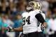 Sep 30, 2013; New Orleans, LA, USA; New Orleans Saints defensive end Cameron Jordan (94) celebrates a sack of Miami Dolphins quarterback Ryan Tannehill (17) during the second half of their game at the Mercedes-Benz Superdome. Mandatory Credit: Chuck Cook-